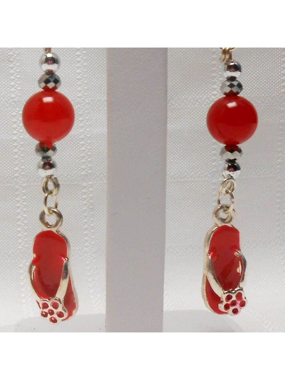 No 141 Handmade earrings with enameled silver shoes charms